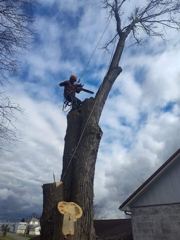 Topping a spar under storm skies