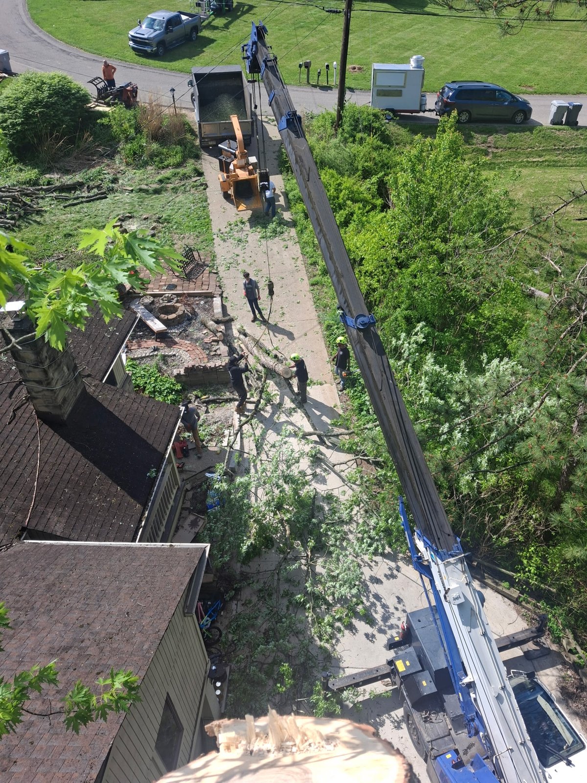 Crane tree removal over a house in Greensburg PA